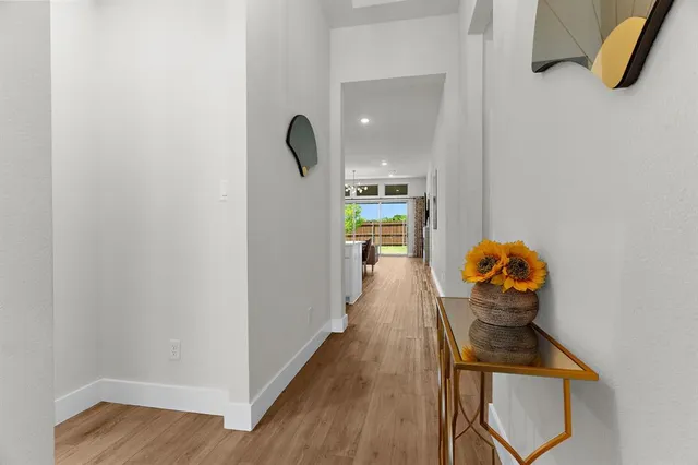 a view of entryway with wooden floor
