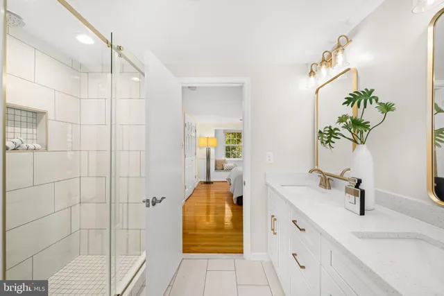 a bathroom with a sink and a shower