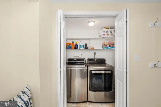 a kitchen with a stove and cabinets