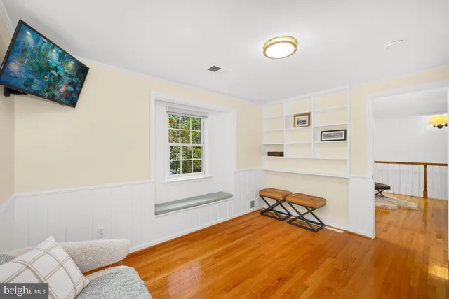 a room with gym equipment and a window