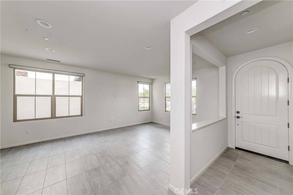 118 Walking Stick Irvine, CA 92618 - Photo 17 of 26 an empty room with windows and closet