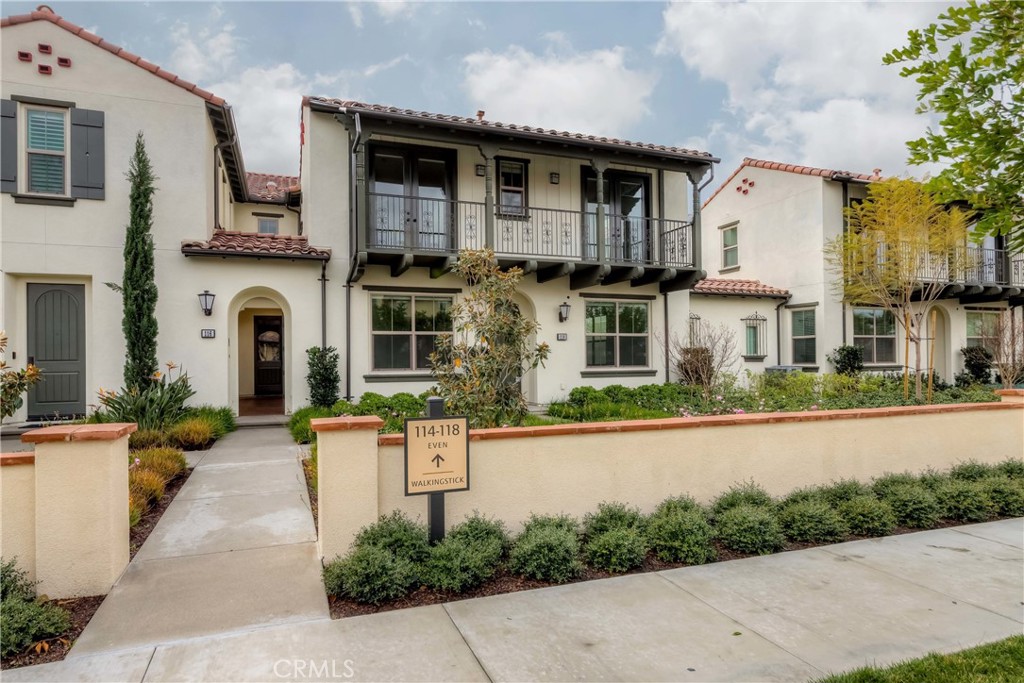118 Walking Stick Irvine, CA 92618 - Photo 25 of 26 a front view of a house with yard