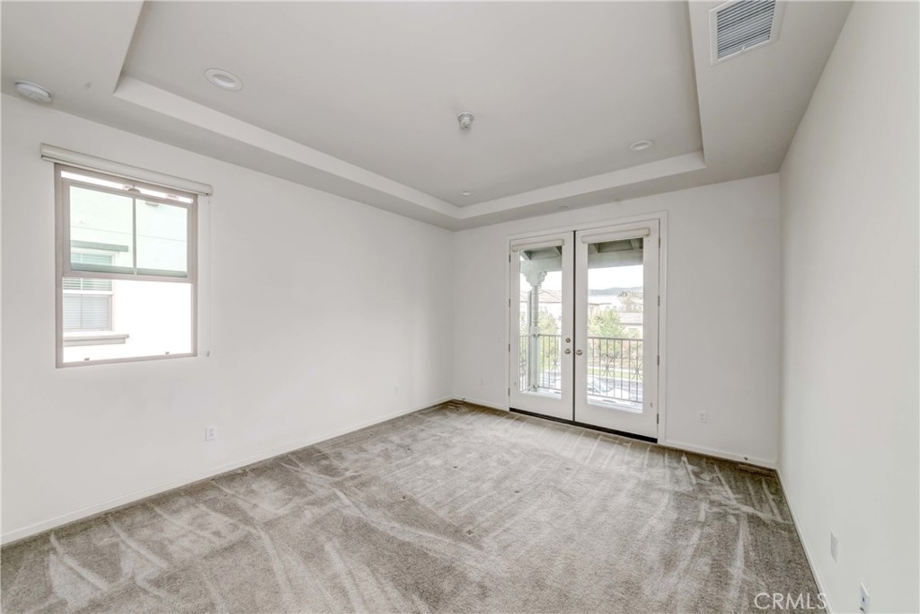 118 Walking Stick Irvine, CA 92618 - Photo 10 of 26 an empty room with windows