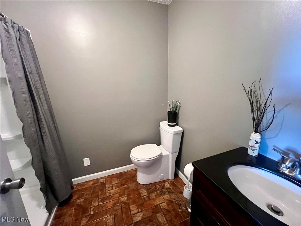 3840 Tabor Ridge Road Northeast Mineral City, OH 44656 - Photo 21 of 40 Bathroom with vanity and toilet