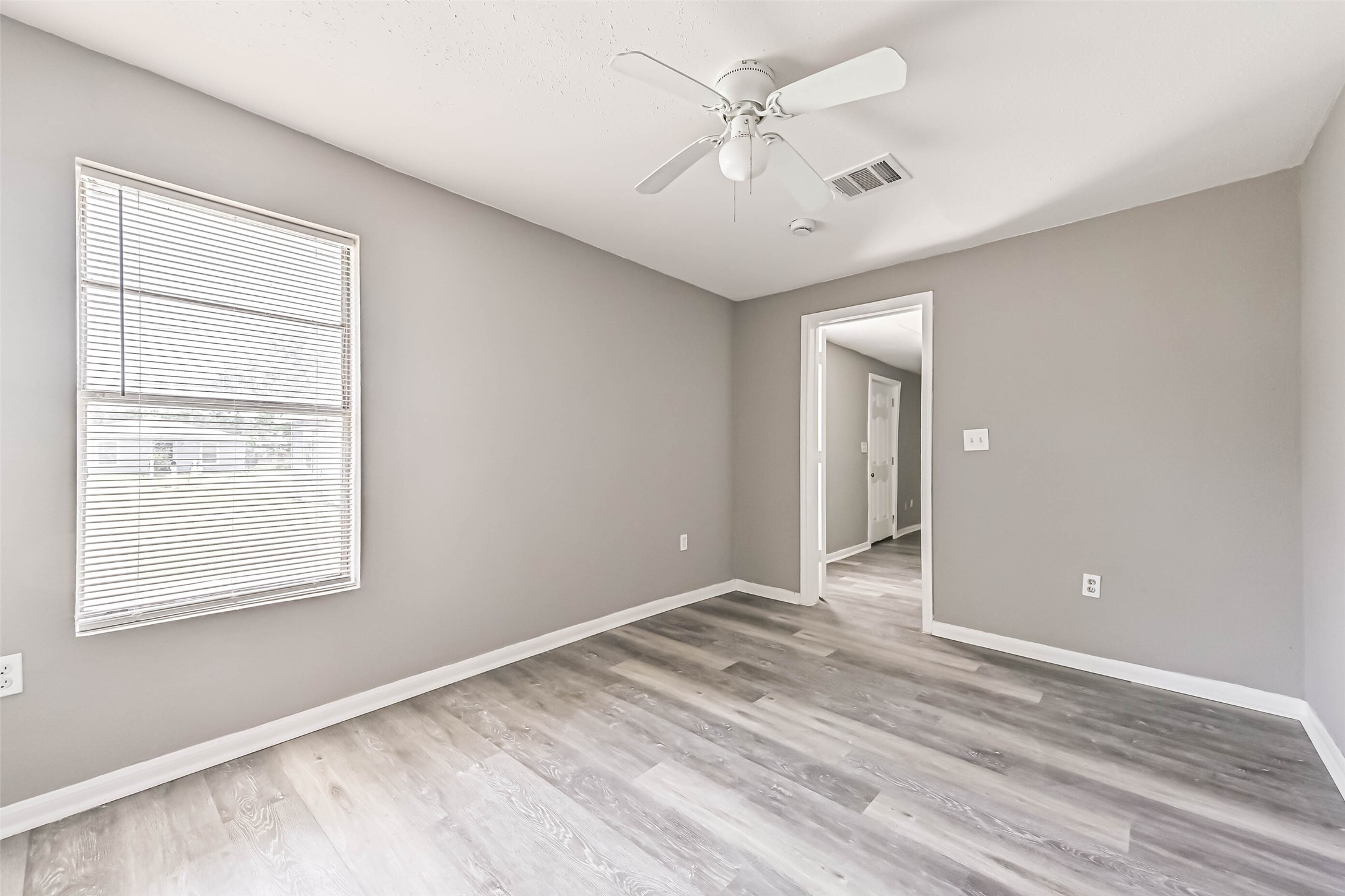9839 Racine Street, Unit 1/2 Houston, TX 77029 - Photo 17 of 26 a view of an empty room with a window