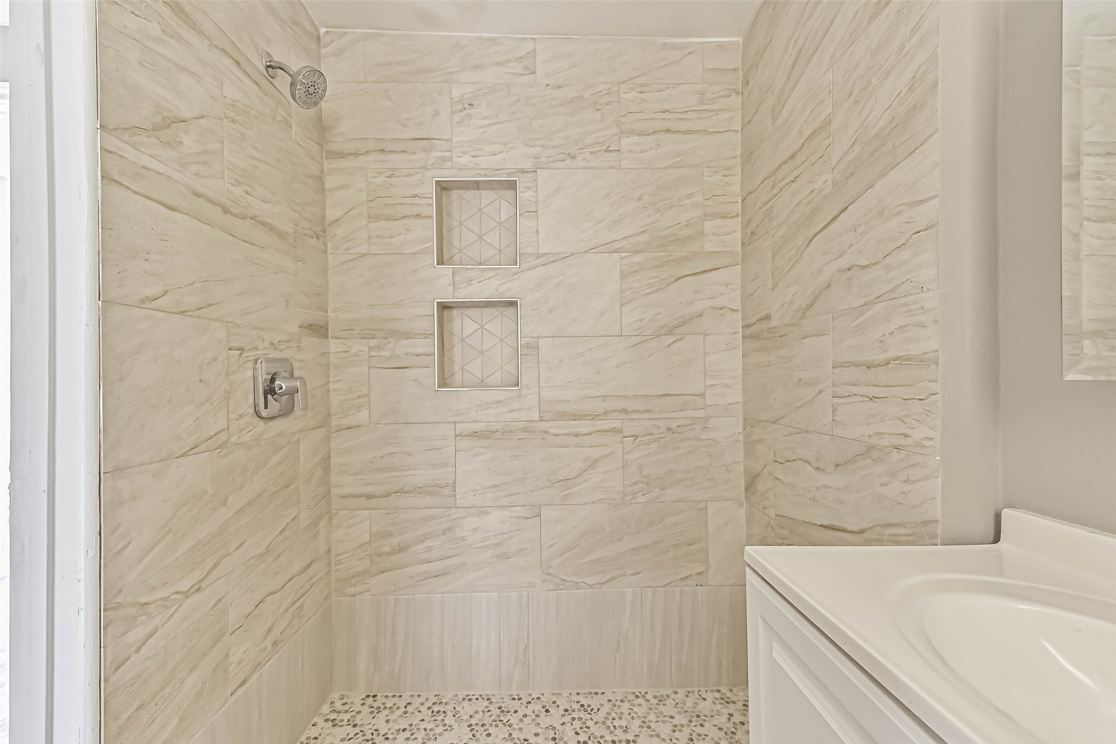 9839 Racine Street, Unit 1/2 Houston, TX 77029 - Photo 20 of 26 a bathroom with a sink and a shower