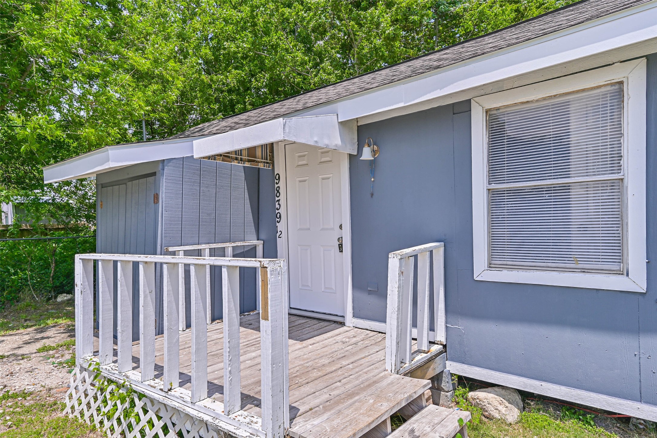 9839 Racine Street, Unit 1/2 Houston, TX 77029 - Photo 5 of 26 a view of wooden balcony