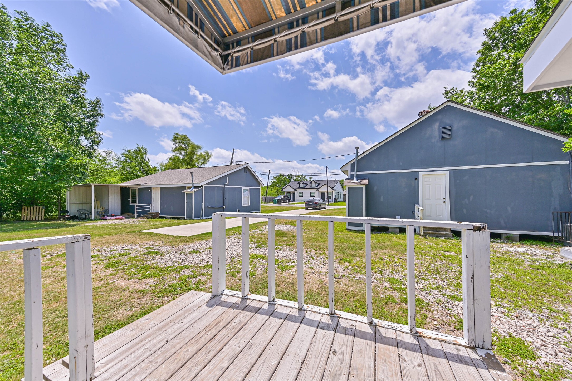 9839 Racine Street, Unit 1/2 Houston, TX 77029 - Photo 7 of 26 a view of a swimming pool with a patio