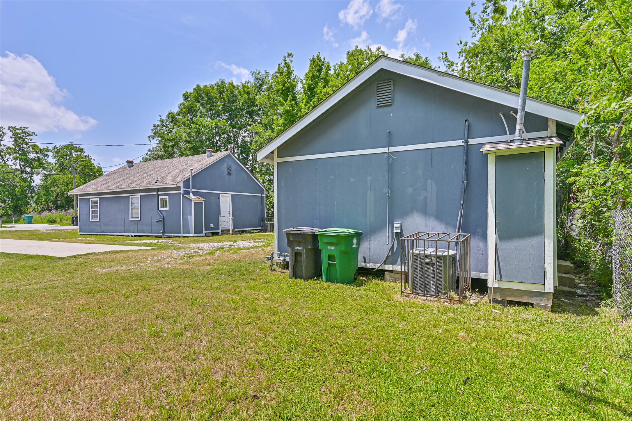 9839 Racine Street, Unit 1/2 Houston, TX 77029 - Photo 9 of 26 a house view with a outdoor space