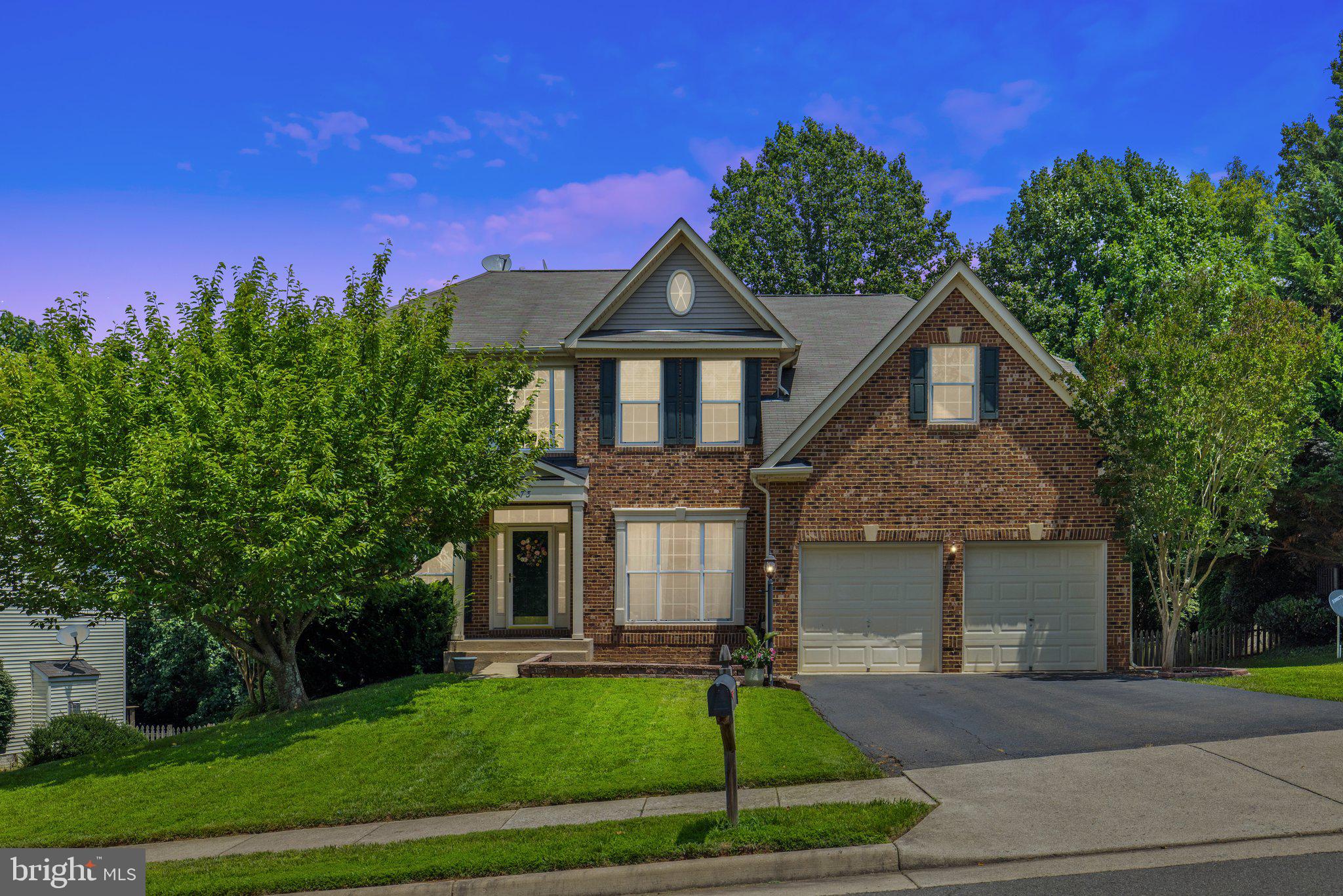 173 Autumn Wind Court Warrenton, VA 20186 - Photo 1 of 68 a front view of a house with a yard