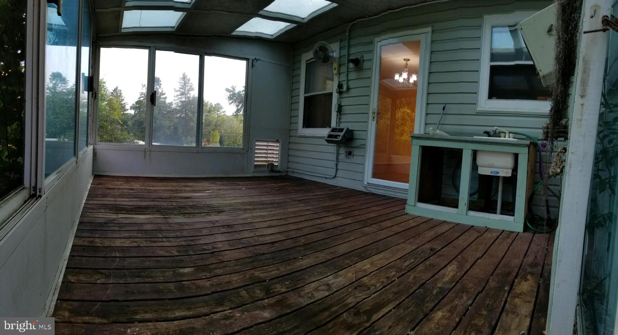11705 Emack Road Beltsville, MD 20705 - Photo 15 of 23 Covered deck area. (Was used as greenhouse.)