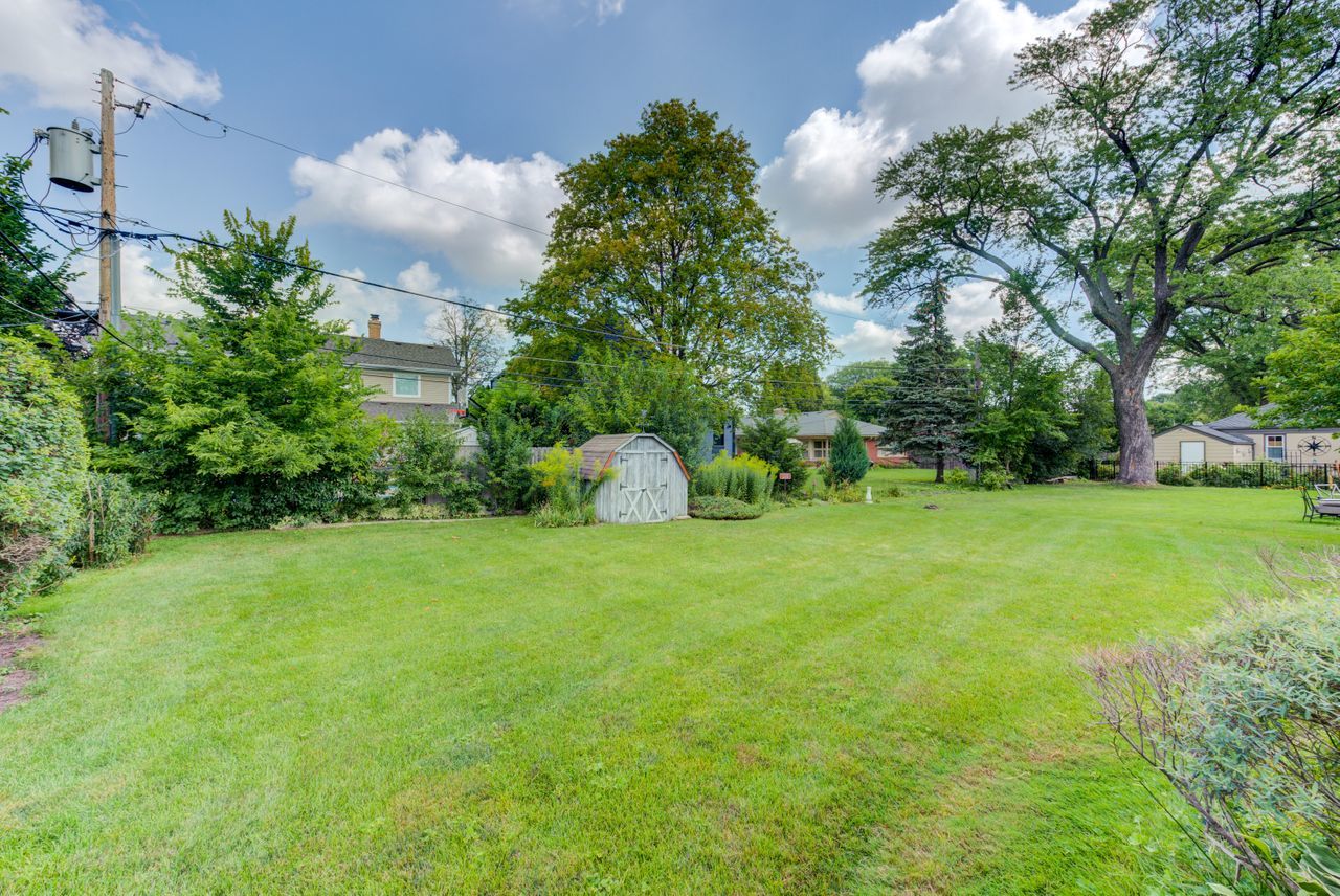 122 Wilma Place Park Ridge, IL 60068 - Photo 19 of 20 a backyard of a house with lots of green space