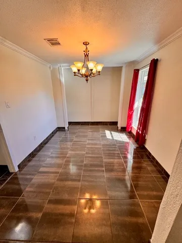 a view of a livingroom with a flat screen tv