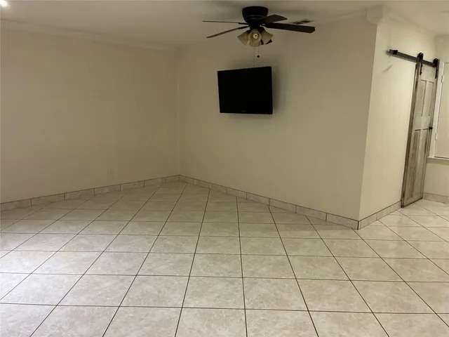 a view of a room with white walls