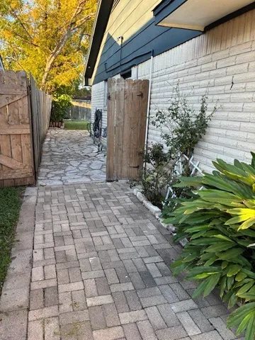 a view of a room with a large window