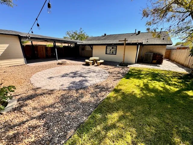 a house view with a garden space