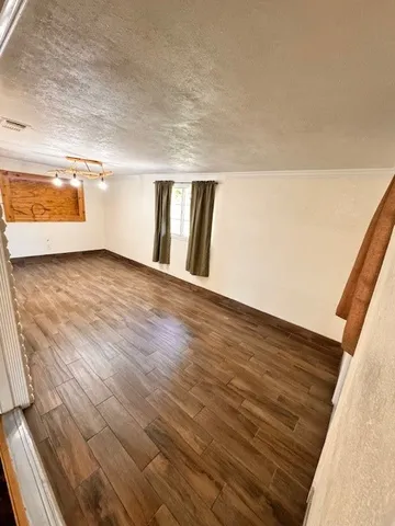 a view of an empty room with window