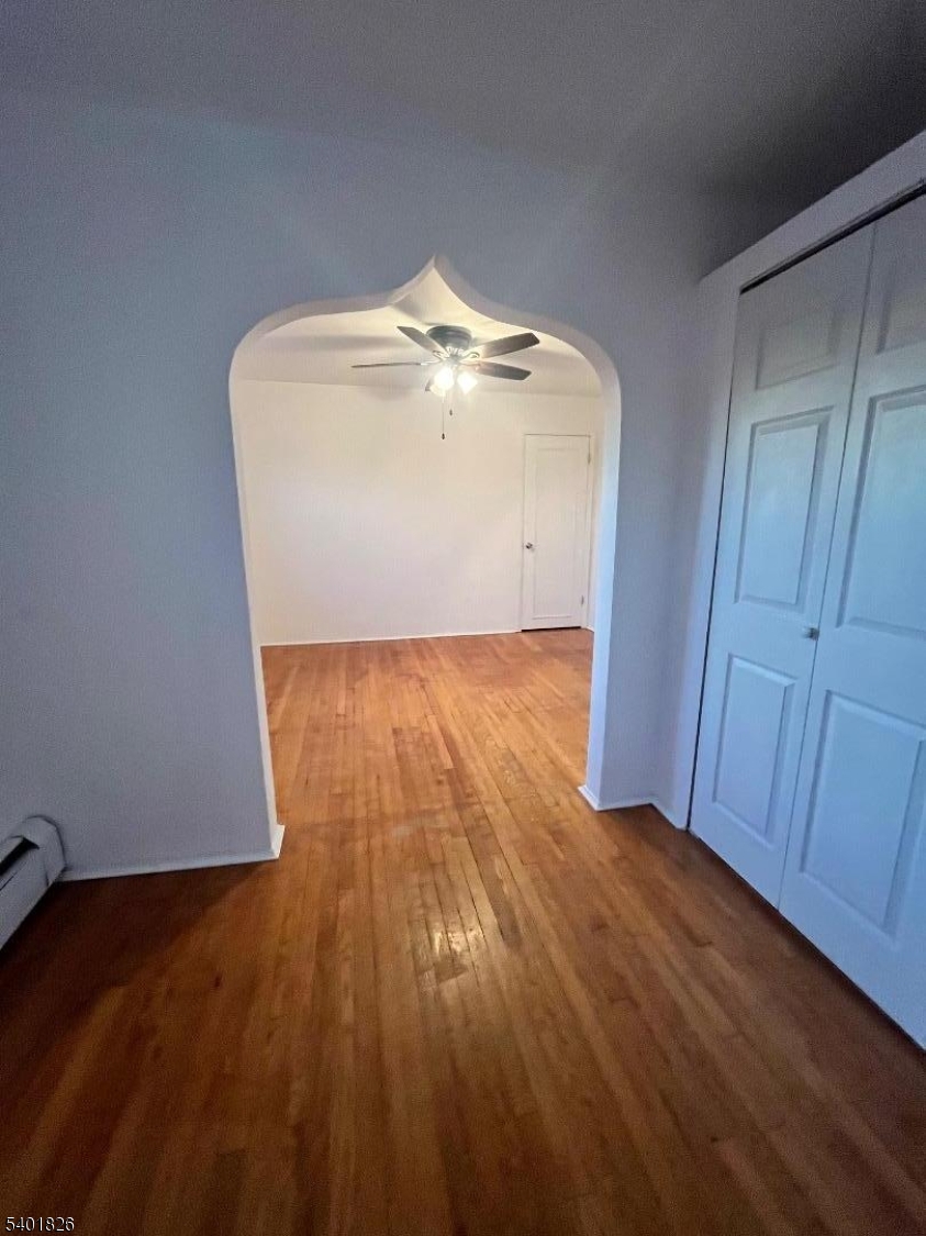 321 Amon Terrace, Unit 1 Linden, NJ 07036 - Photo 15 of 15 a view of a room with wooden floor