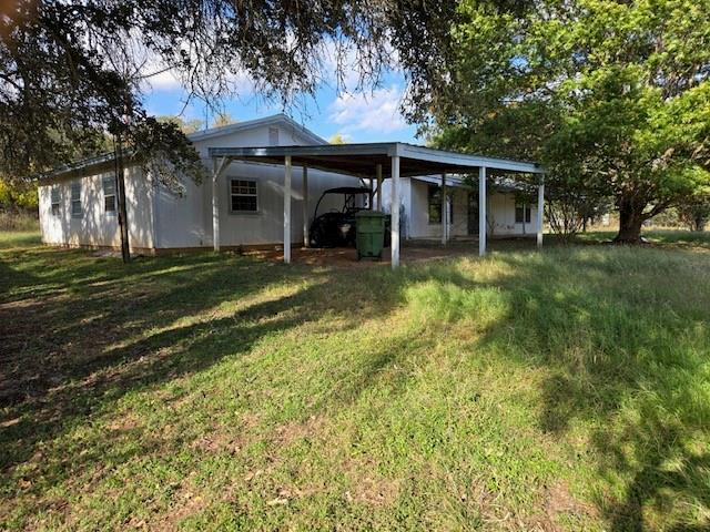 300 A E 3rd Street Iredell, TX 76649 - Photo 2 of 11 a view of a house with a yard