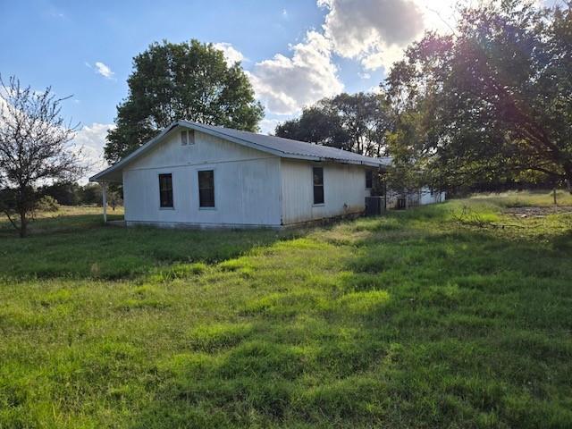 300 A E 3rd Street Iredell, TX 76649 - Photo 3 of 11 a house view with a garden space