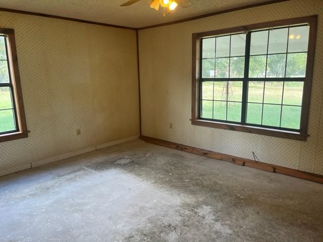 300 A E 3rd Street Iredell, TX 76649 - Photo 8 of 11 an empty room with a window