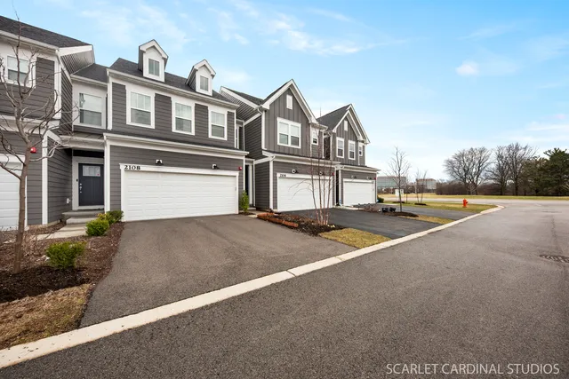 a view of a street with houses