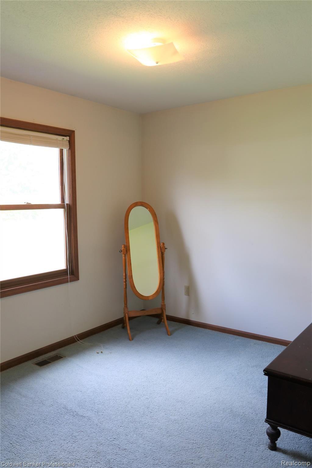 139 Williams Street Perry, MI 48872 - Photo 11 of 18 13 139 Bedroom 2.JPG