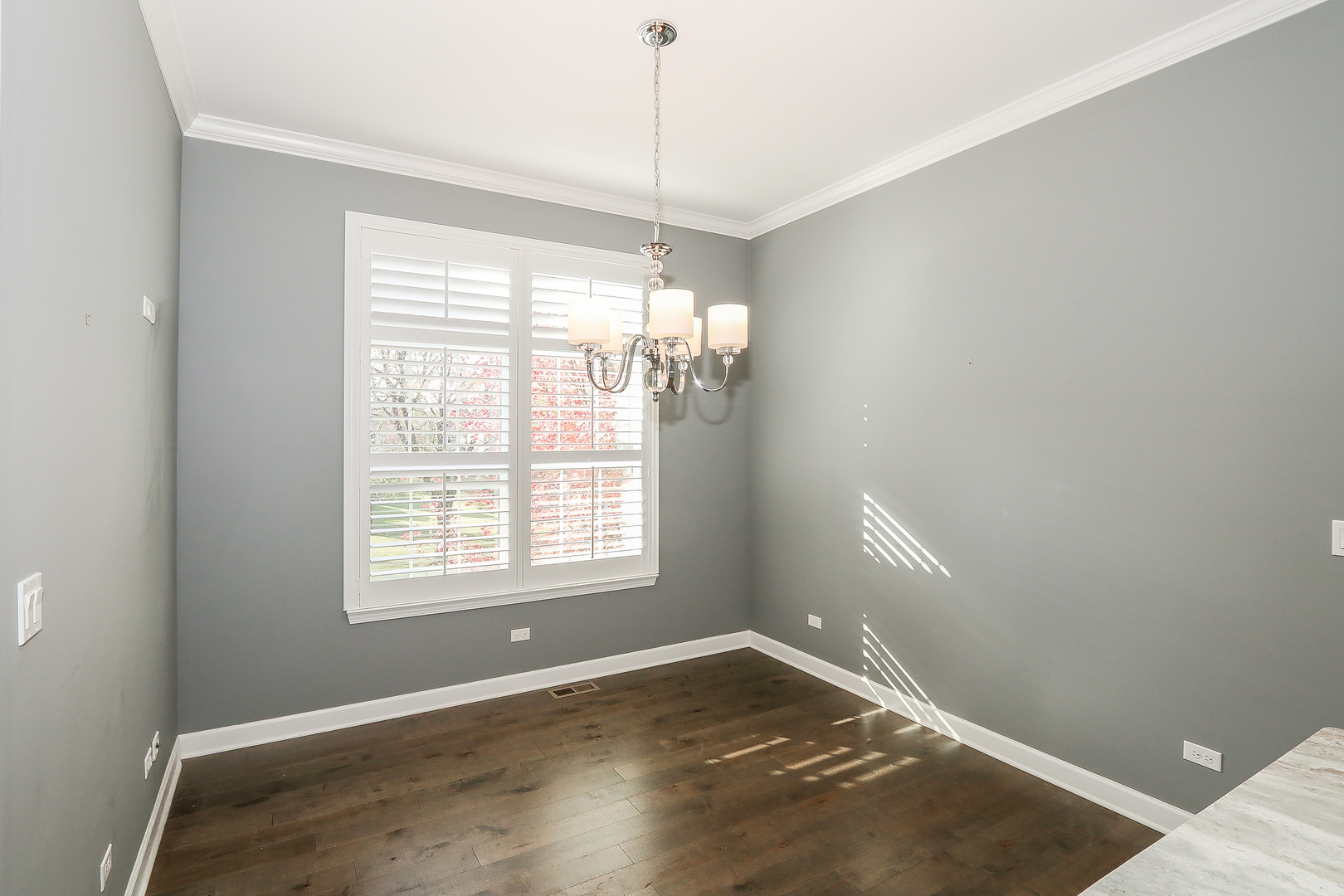 6 Sugar Maple Court Lake In The Hills, IL 60156 - Photo 15 of 35 a view of empty room with wooden floor and fan