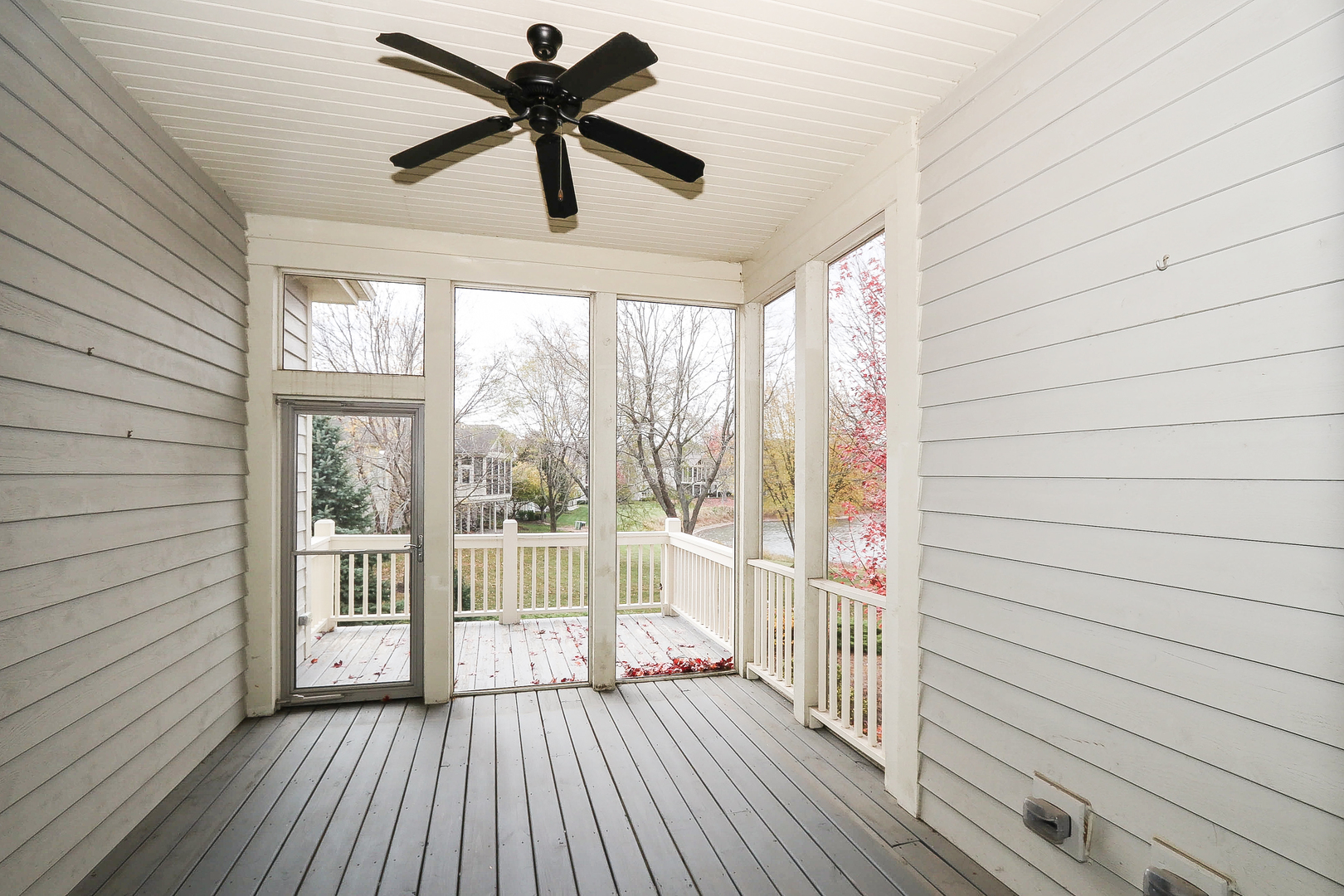 6 Sugar Maple Court Lake In The Hills, IL 60156 - Photo 17 of 35 a view of empty room with wooden floor and fan