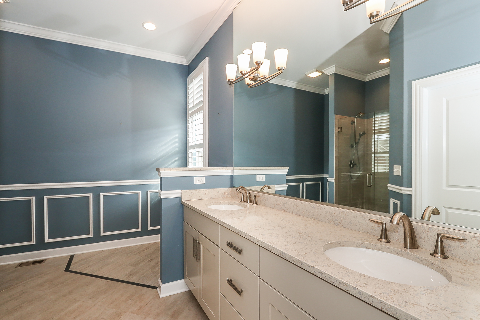 6 Sugar Maple Court Lake In The Hills, IL 60156 - Photo 20 of 35 a bathroom with a sink double vanity and a mirror