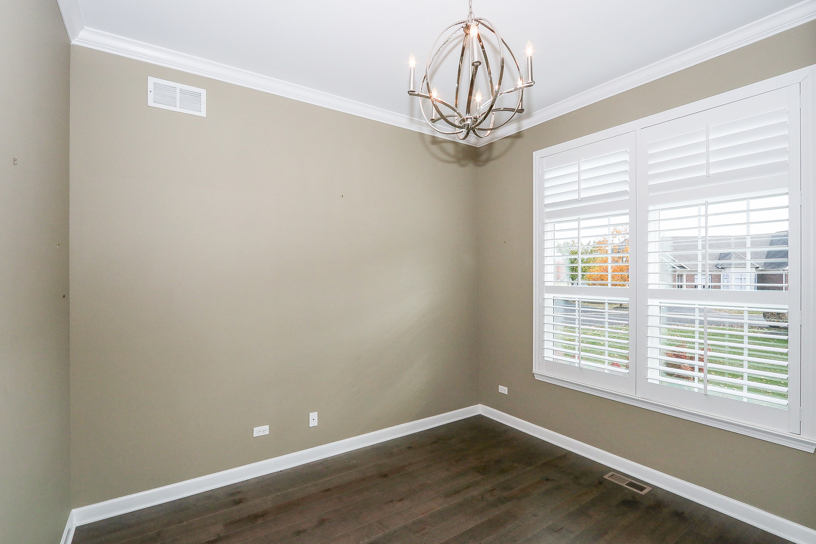 6 Sugar Maple Court Lake In The Hills, IL 60156 - Photo 23 of 35 a view of a livingroom with a window and wooden floor
