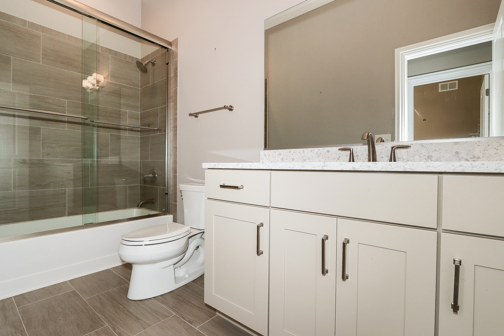 6 Sugar Maple Court Lake In The Hills, IL 60156 - Photo 24 of 35 a bathroom with a sink toilet and shower