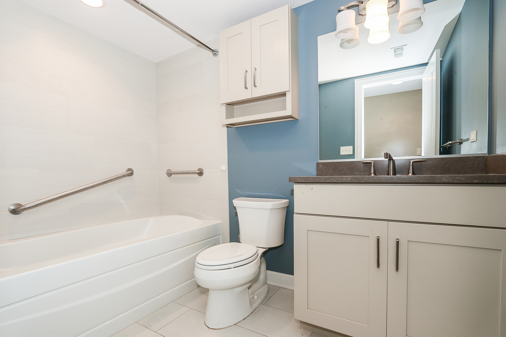 6 Sugar Maple Court Lake In The Hills, IL 60156 - Photo 31 of 35 a bathroom with a sink a toilet and shower