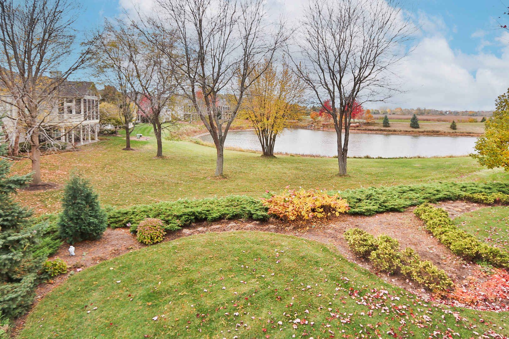 6 Sugar Maple Court Lake In The Hills, IL 60156 - Photo 34 of 35 a view of an outdoor space with a garden