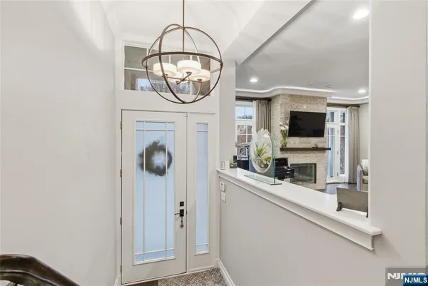 a kitchen with stainless steel appliances granite countertop a microwave a stove and a sink