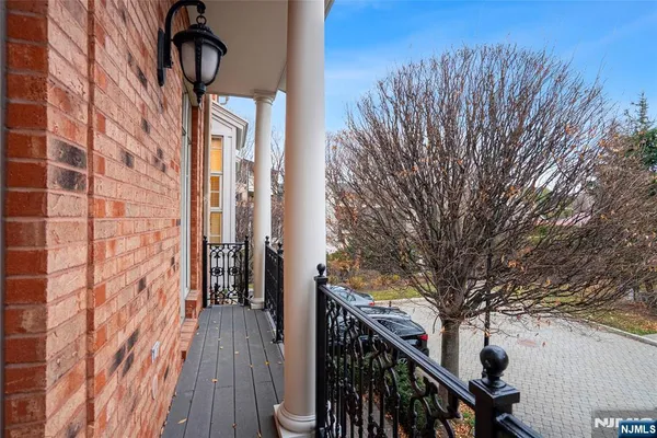 a view of a pathway with a wooden stairs
