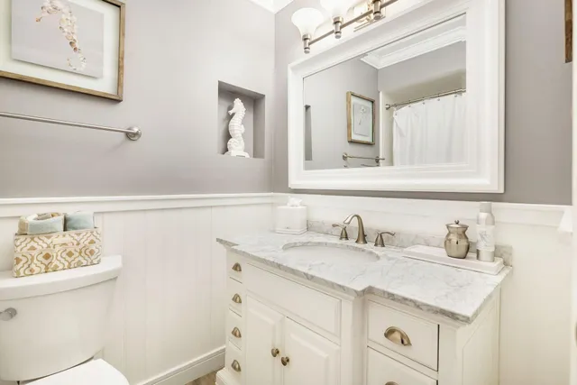 a bathroom with a sink and a toilet