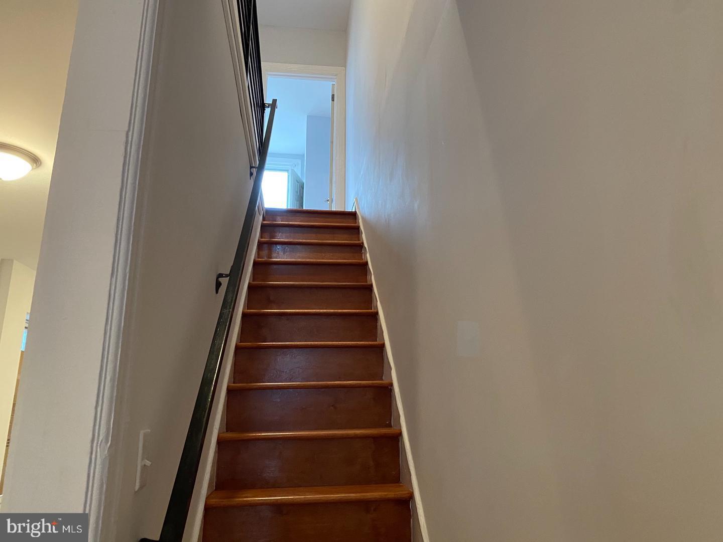 1481 North Wilton Street Philadelphia, PA 19131 - Photo 4 of 9 Inviting ascent to upper living spaces.