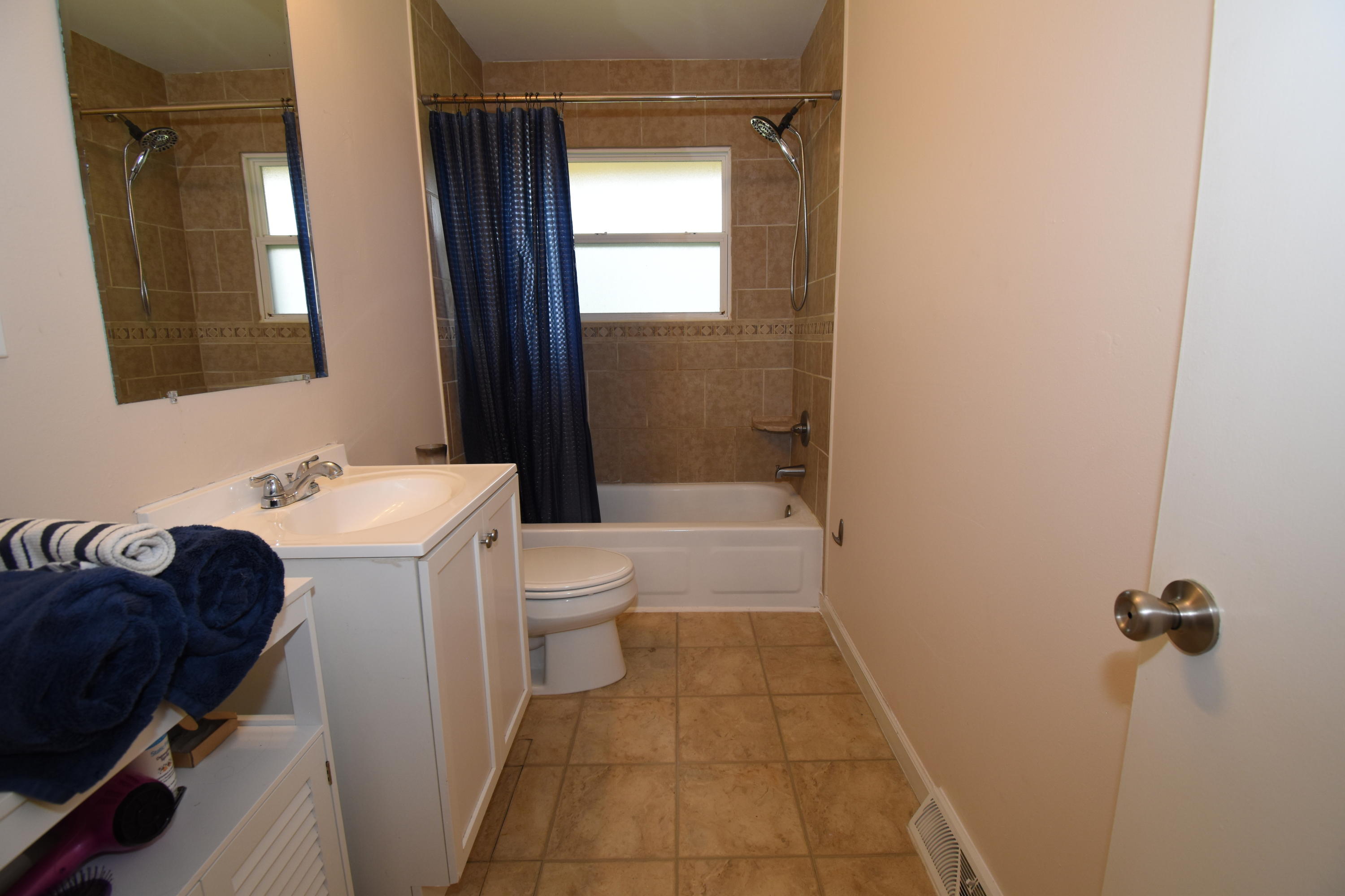 635 Ramada Road Vinton, VA 24179 - Photo 13 of 38 a bathroom with a sink toilet and shower