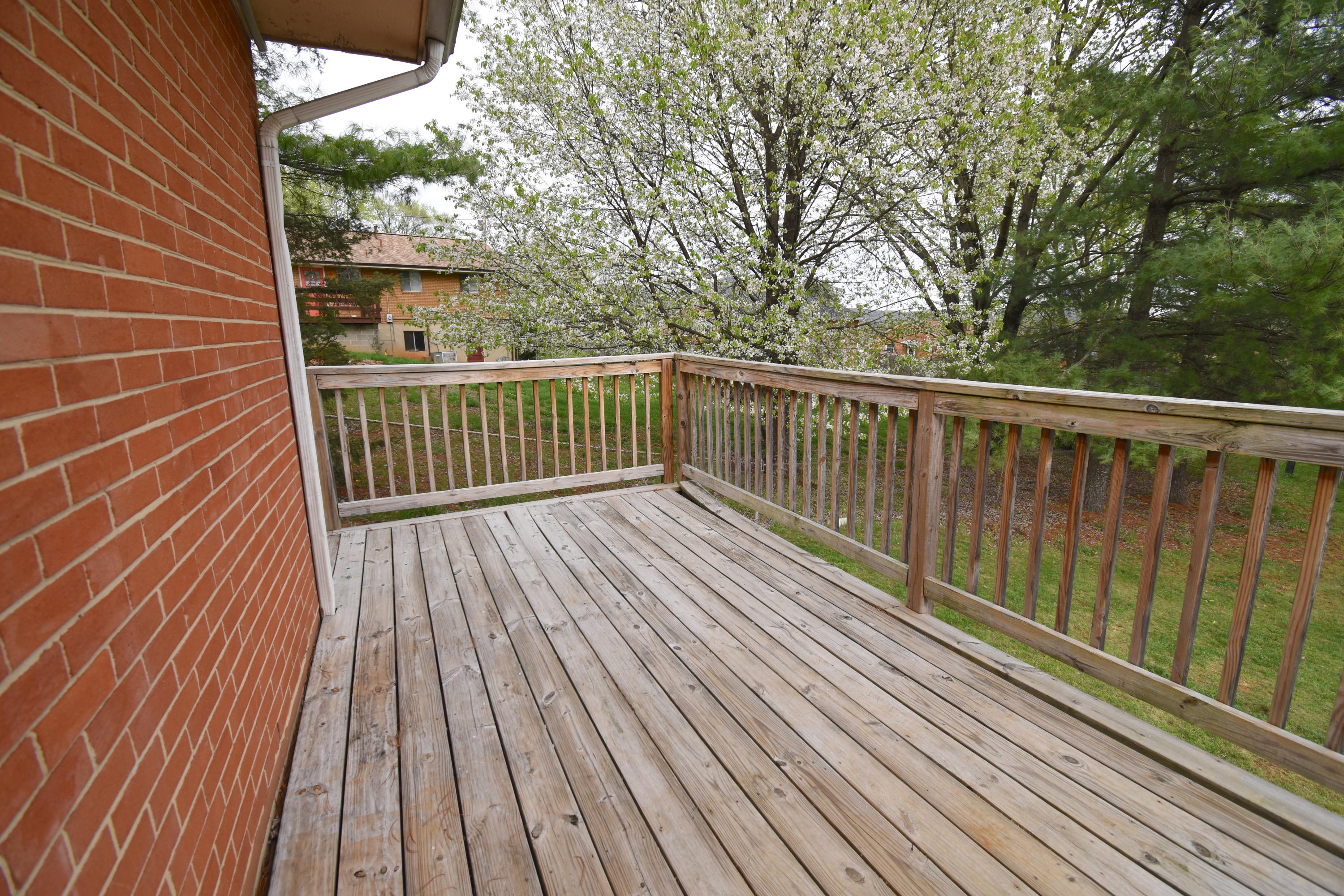 635 Ramada Road Vinton, VA 24179 - Photo 34 of 38 a view of balcony with wooden floor and fence