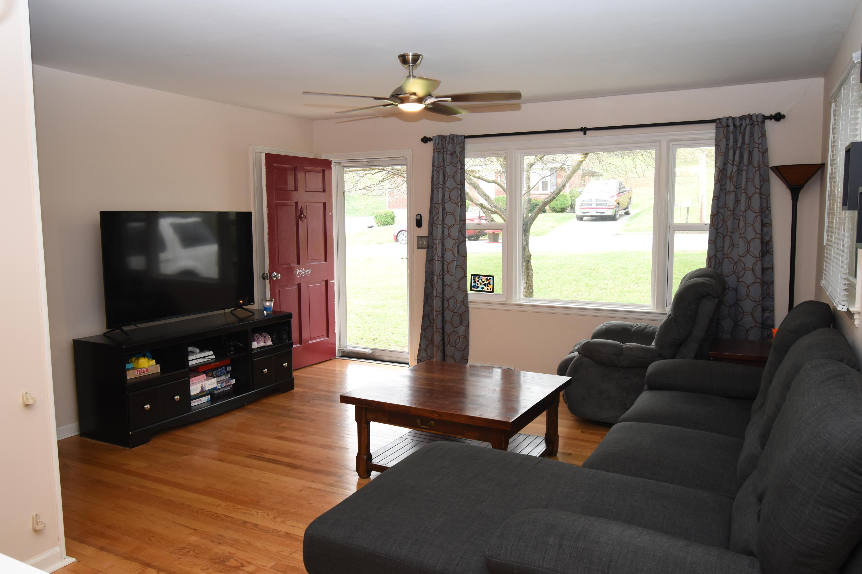 635 Ramada Road Vinton, VA 24179 - Photo 6 of 38 a living room with furniture and a flat screen tv