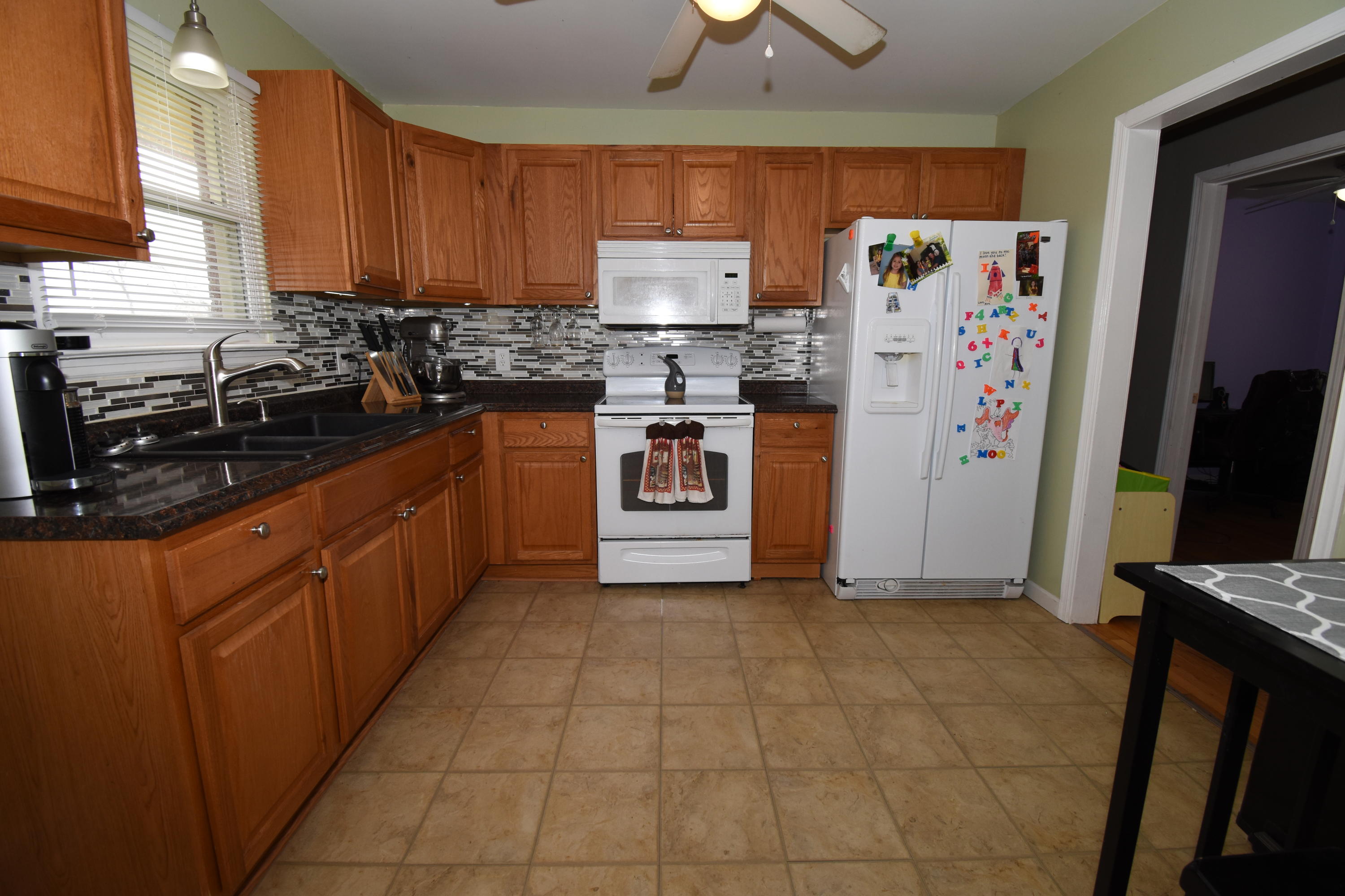 635 Ramada Road Vinton, VA 24179 - Photo 8 of 38 a kitchen with stainless steel appliances granite countertop a refrigerator stove and sink