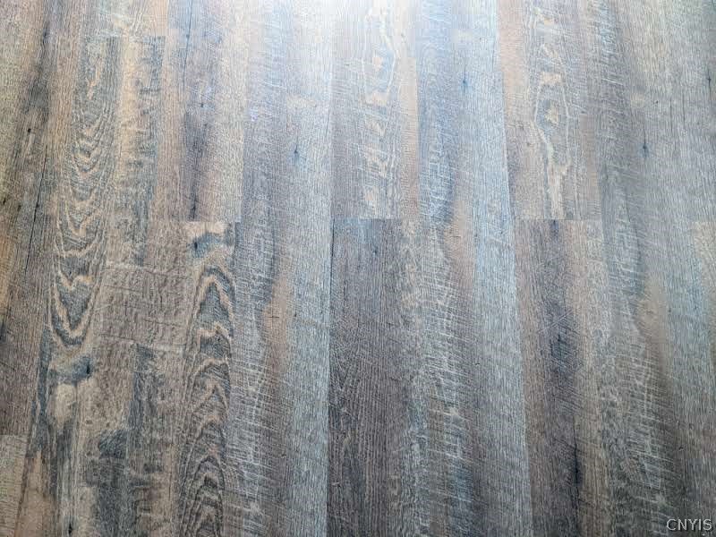 1004 Buckley Road Salina, NY 13088 - Photo 18 of 45 This flooring was just added in the two downstairs