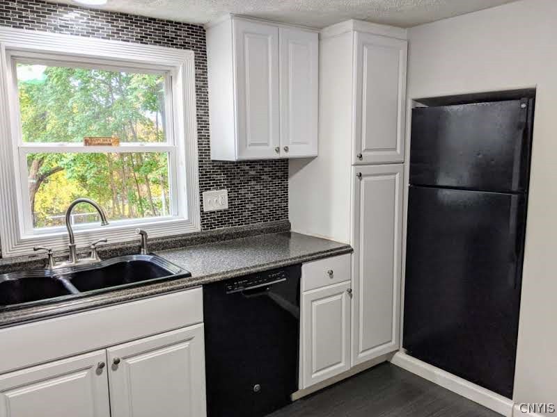1004 Buckley Road Salina, NY 13088 - Photo 9 of 45 Plenty of storage in this kitchen with the built i