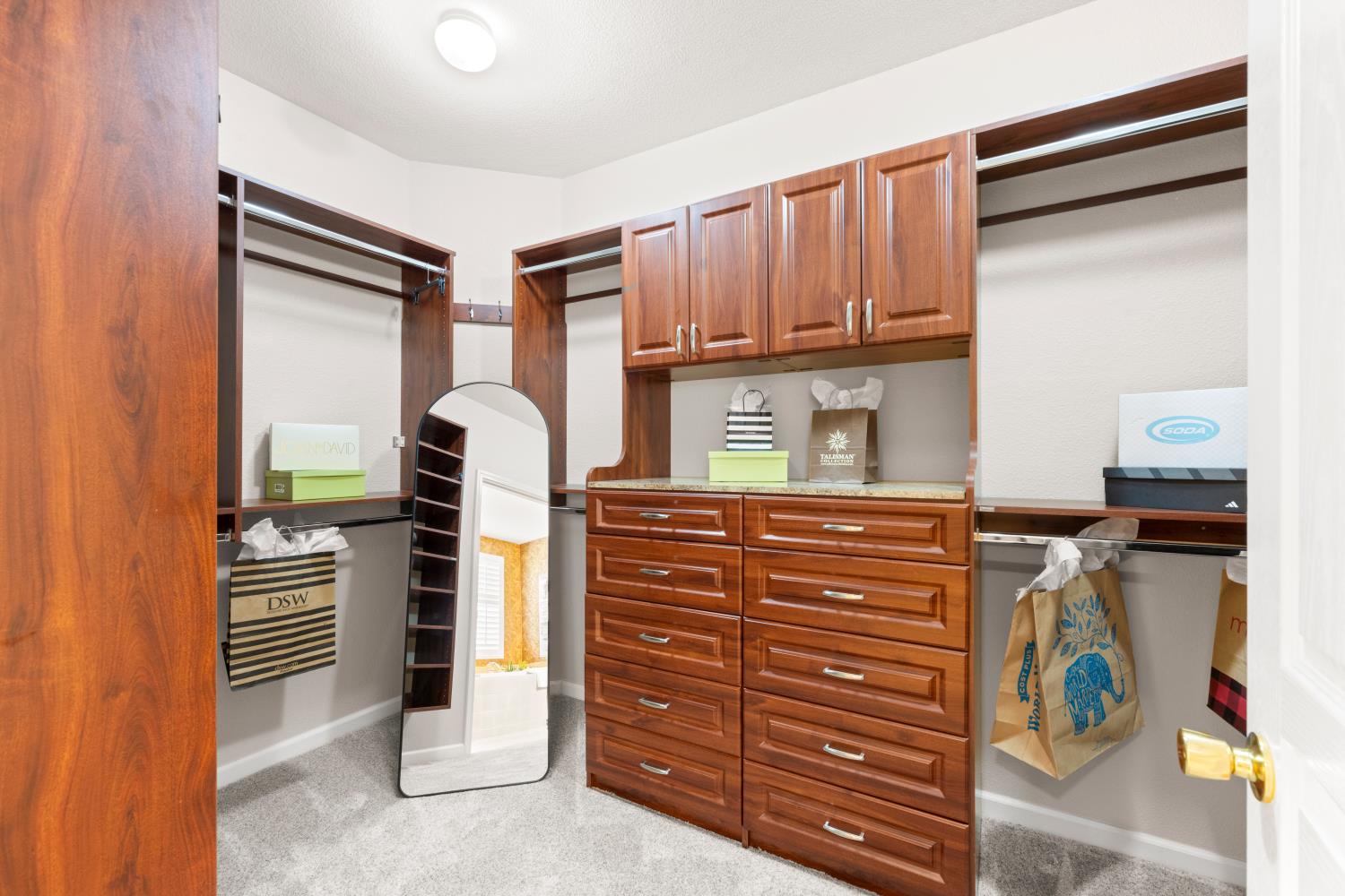 2306 Longspur Loop Lincoln, CA 95648 - Photo 46 of 59 Primary walk in closet has lots of quality built inis