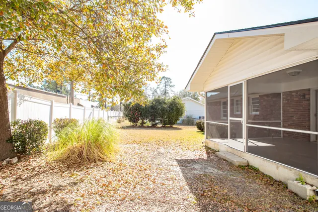 a view of a balcony with a potted plant