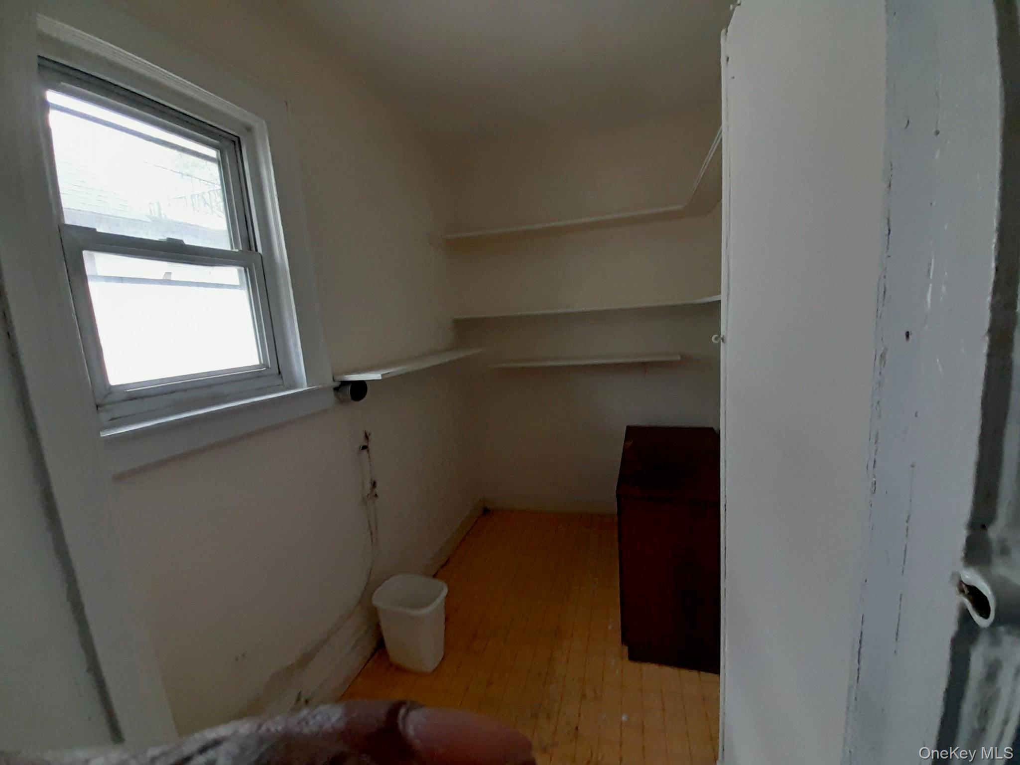 159-32 Normal Road, Unit 2 Queens, NY 11432 - Photo 7 of 13 a view of storage and utility room with a door
