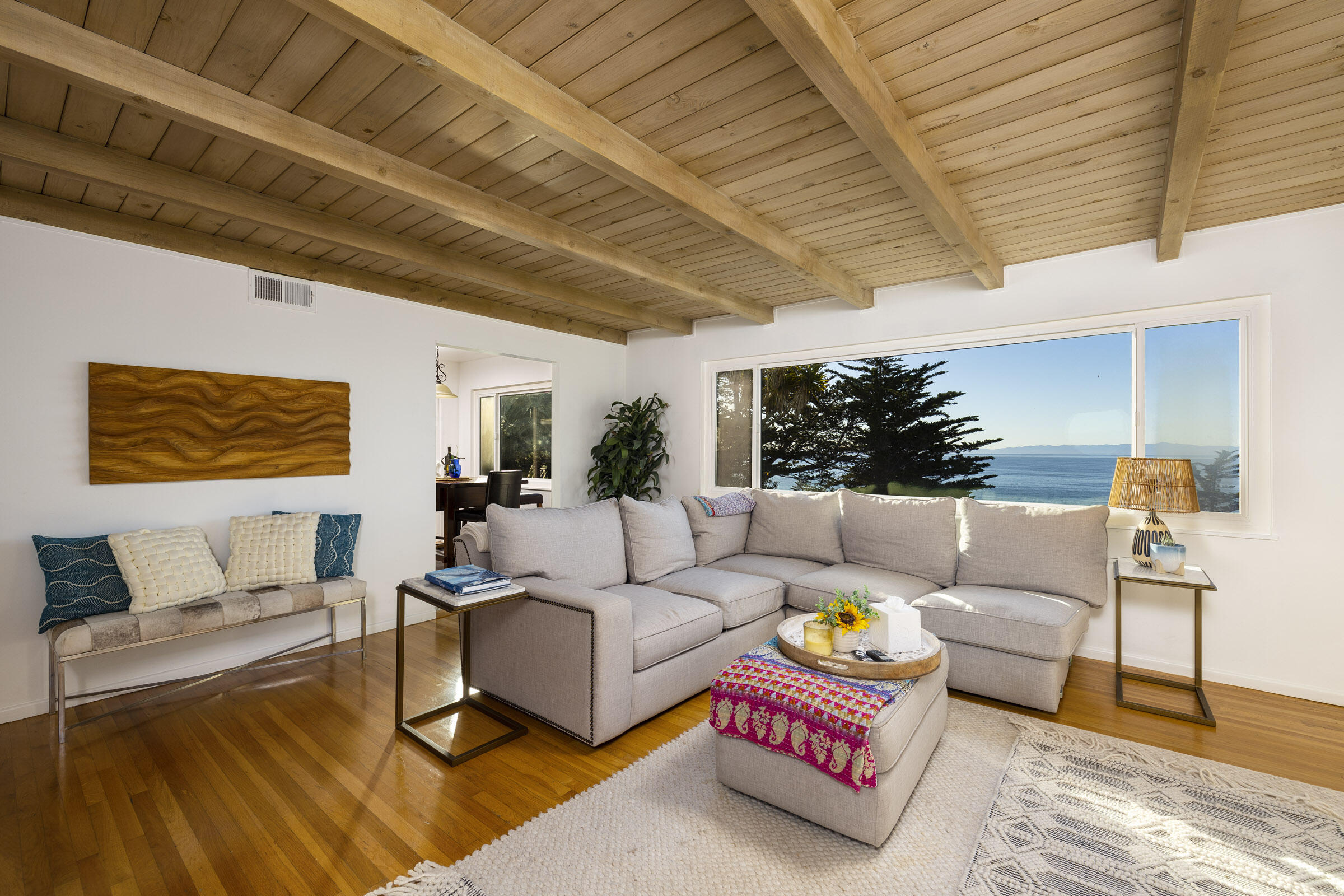 1919 El Camino De La Luz Santa Barbara, CA 93109 - Photo 16 of 28 a living room with furniture and a wooden floor