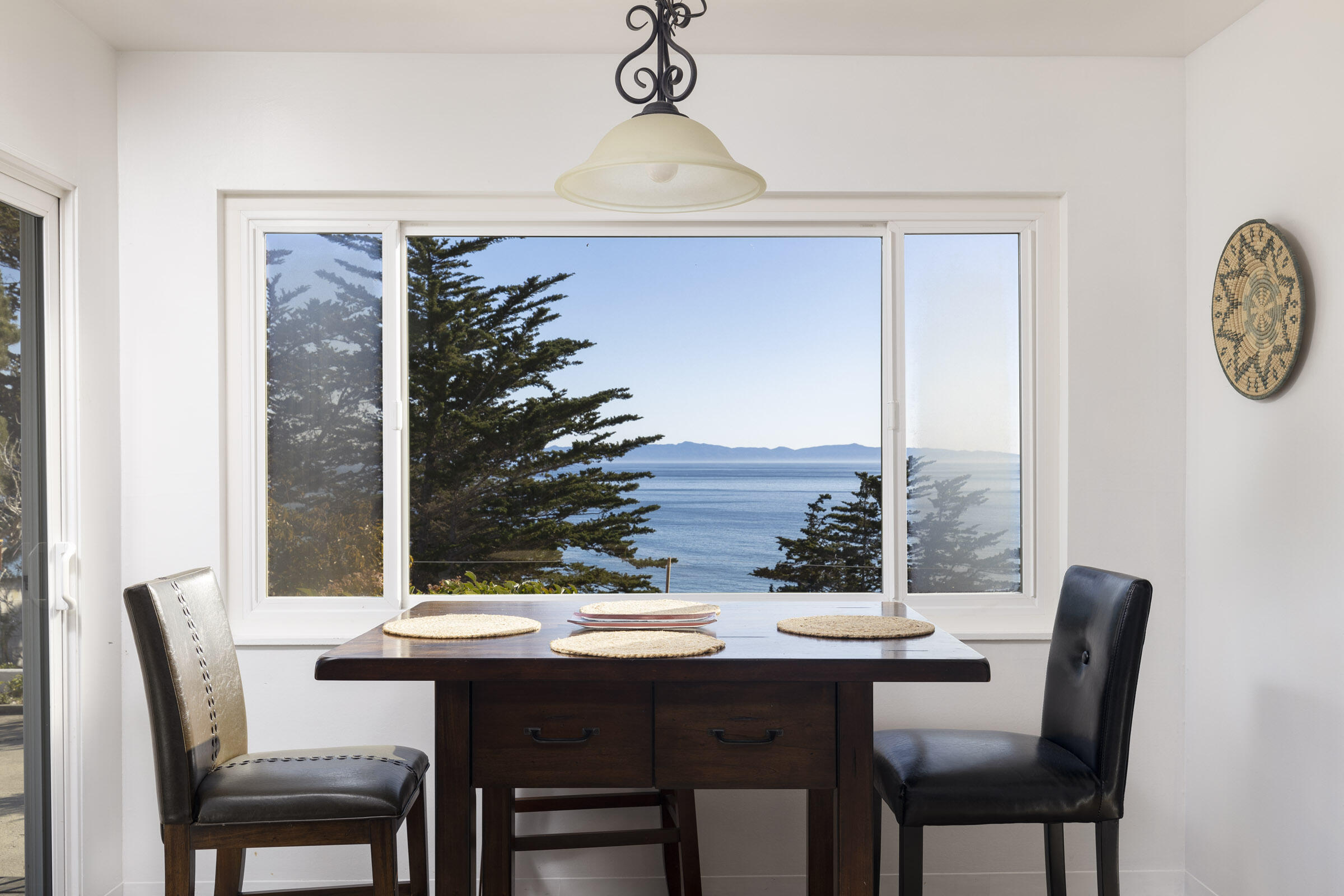1919 El Camino De La Luz Santa Barbara, CA 93109 - Photo 19 of 28 a view of a dining room with furniture and window