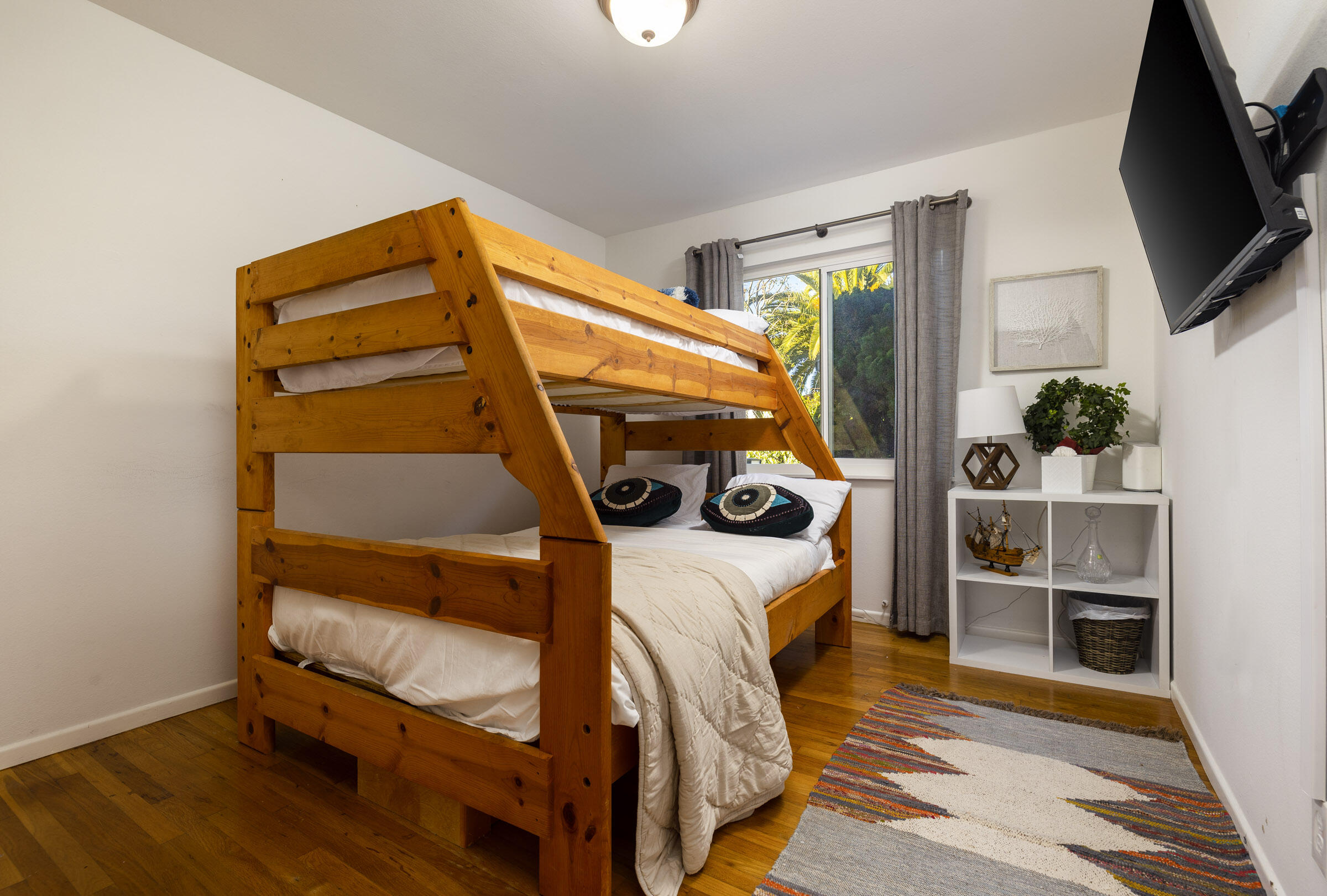 1919 El Camino De La Luz Santa Barbara, CA 93109 - Photo 24 of 28 a bed room with a bed and a tv